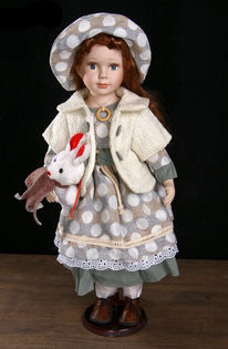 Коллекционная кукла с игрушкой 